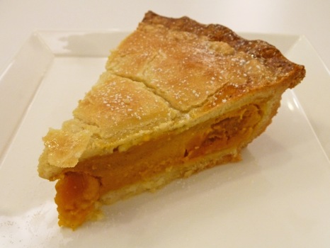 Pies & Coffee's pumpkin pie crust borrows a line from shortbread and flirts with butter, and its filling beckons from beneath.